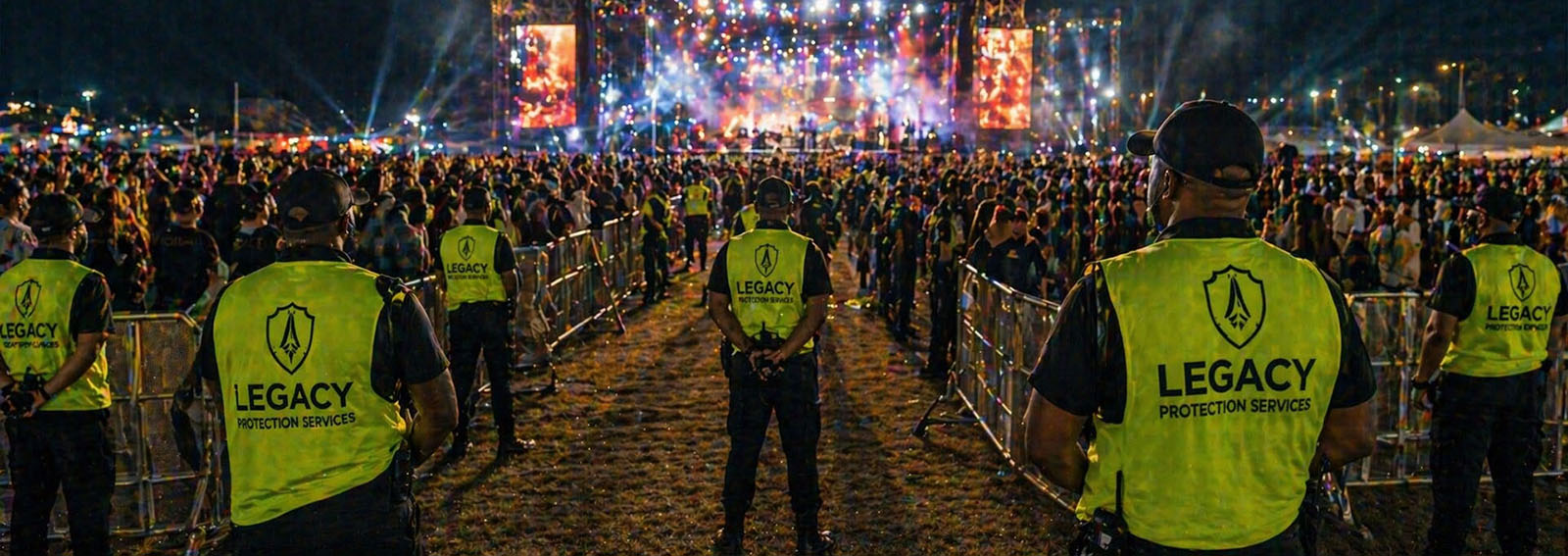 Legacy Protection Services event security team managing crowd control and access at a large concert or public gathering